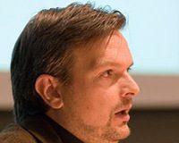 Romano Benini autore di Quasi italiani