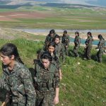 Kurdish fighters in the Women’s Protection Unit during their daily drills at Shilan Camp, in the border region of Andivar, Rojava, Syria, summer 2015