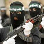 Terroristi a volto coperto(foto La voce del Trentino)